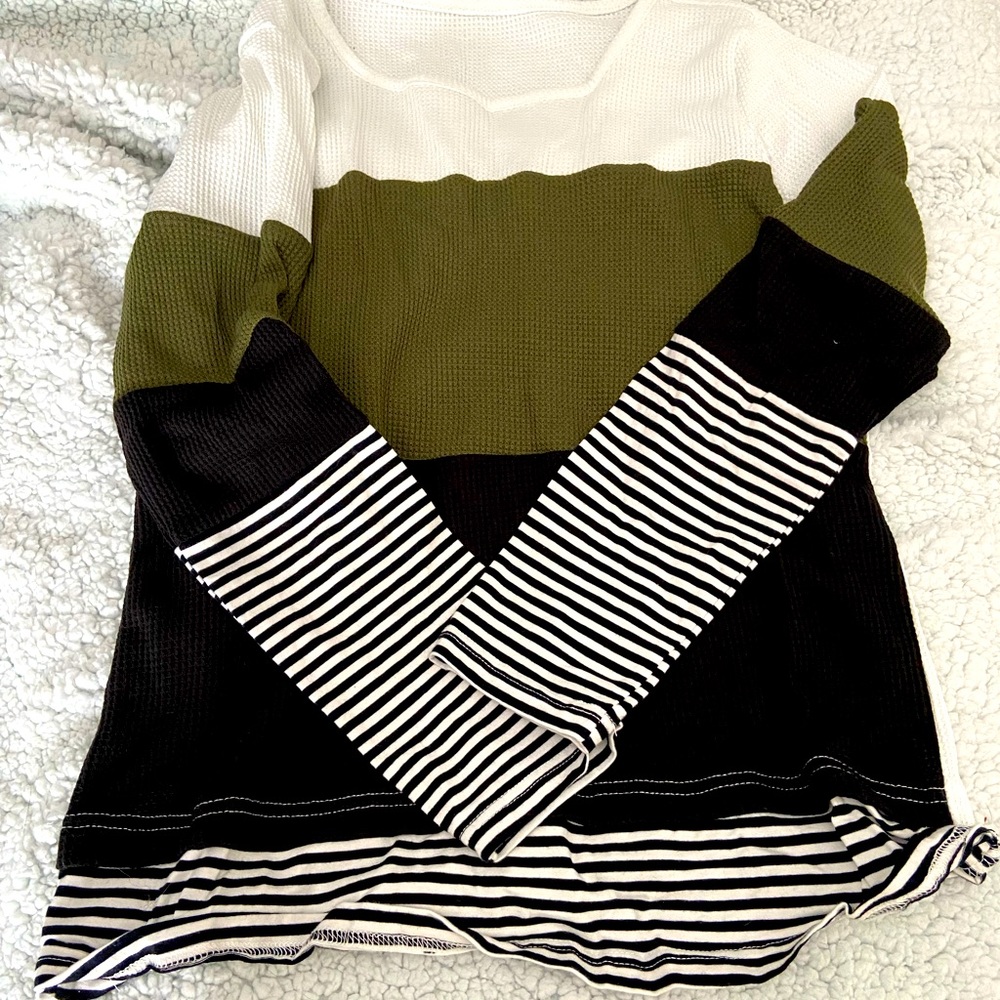 Size medium long sleeve tee.